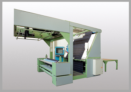 INSPECTION MACHINE WITH CROSS LAPPER CARRIAGE
