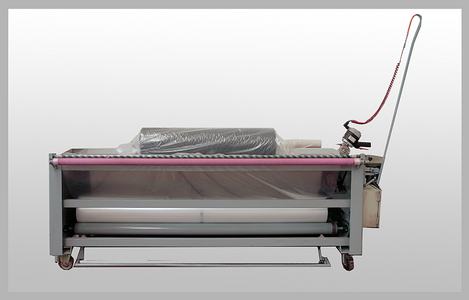 SEMI-AUTOMATIC PACKING MACHINES FOR FABRIC ROLLS