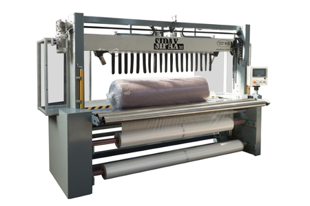 PACKING MACHINES - WRAPPING MACHINE - FABRIC ROLL PACKING MACHINE